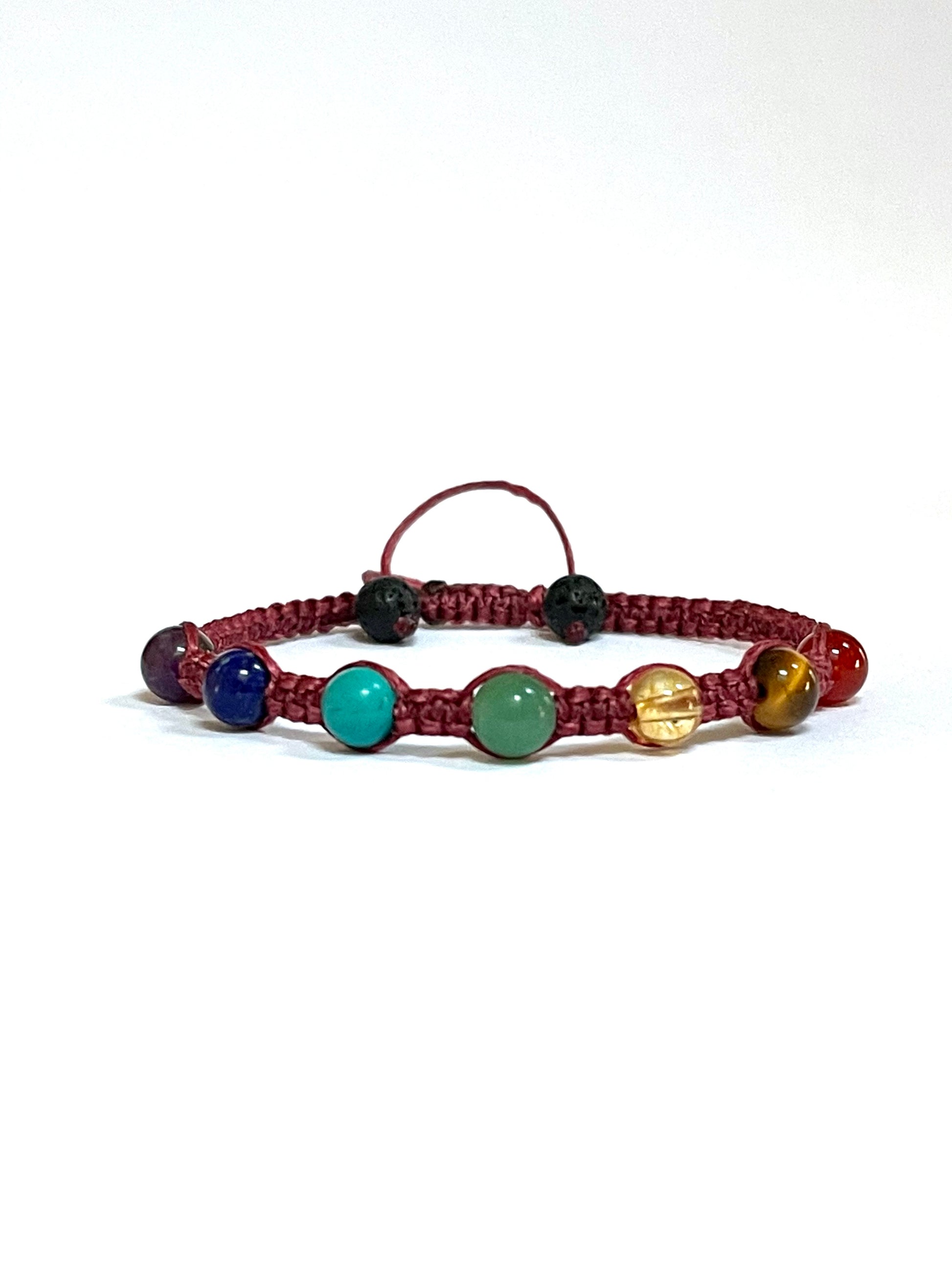 seven chakra macrame bracelet made from natural amethyst,lapis lazuli,aventurine,citrine,turquoise,tiger eye,carnelian with pink cotton waxed cord.