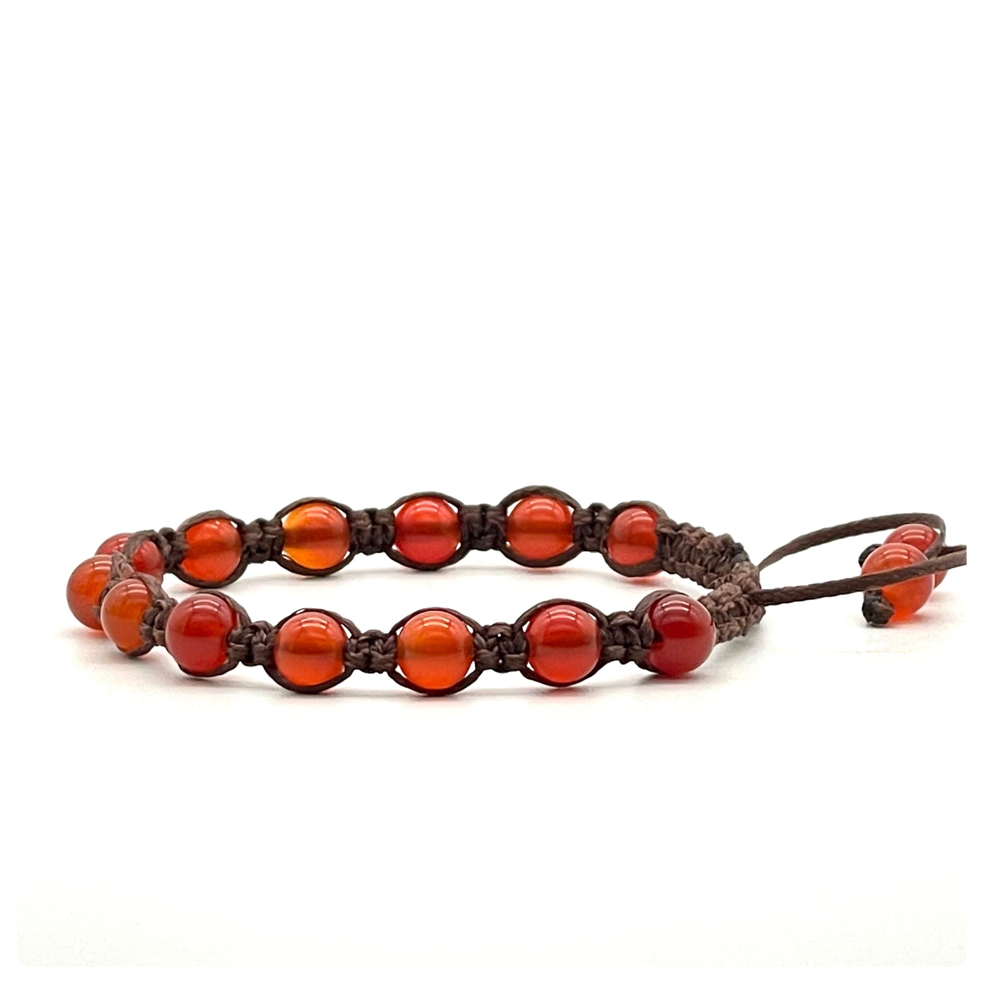 A macrame bracelet made with 6mm carnelian beads, crafted from brown cotton waxed cord, adjustable from 17cm to 22cm, suitable for both men and women.