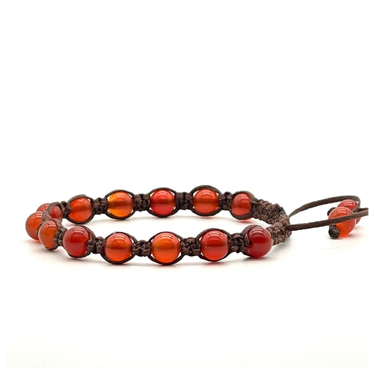 A macrame bracelet made with 6mm carnelian beads, crafted from brown cotton waxed cord, adjustable from 17cm to 22cm, suitable for both men and women.