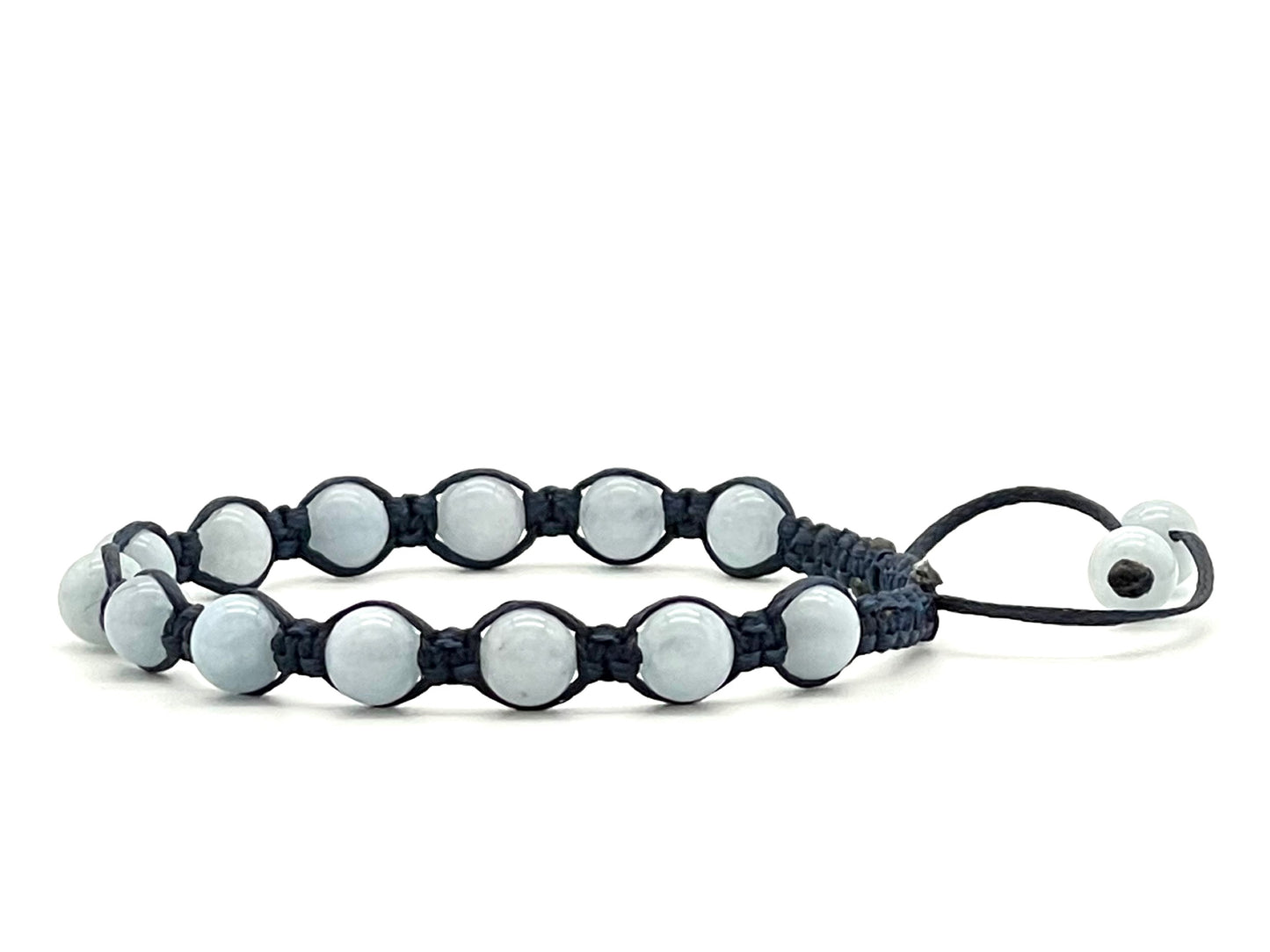 A macrame bracelet made with 6mm aquamarine beads, crafted from blue cotton waxed cord, adjustable from 17cm to 22cm, suitable for both men and women.