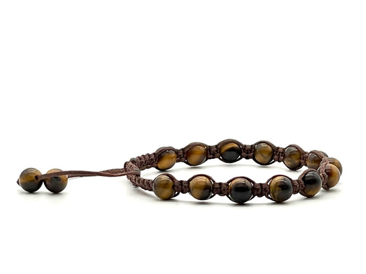 A macrame bracelet made with 6mm tiger eye beads, crafted from brown cotton waxed cord, adjustable from 17cm to 22cm, suitable for both men and women.