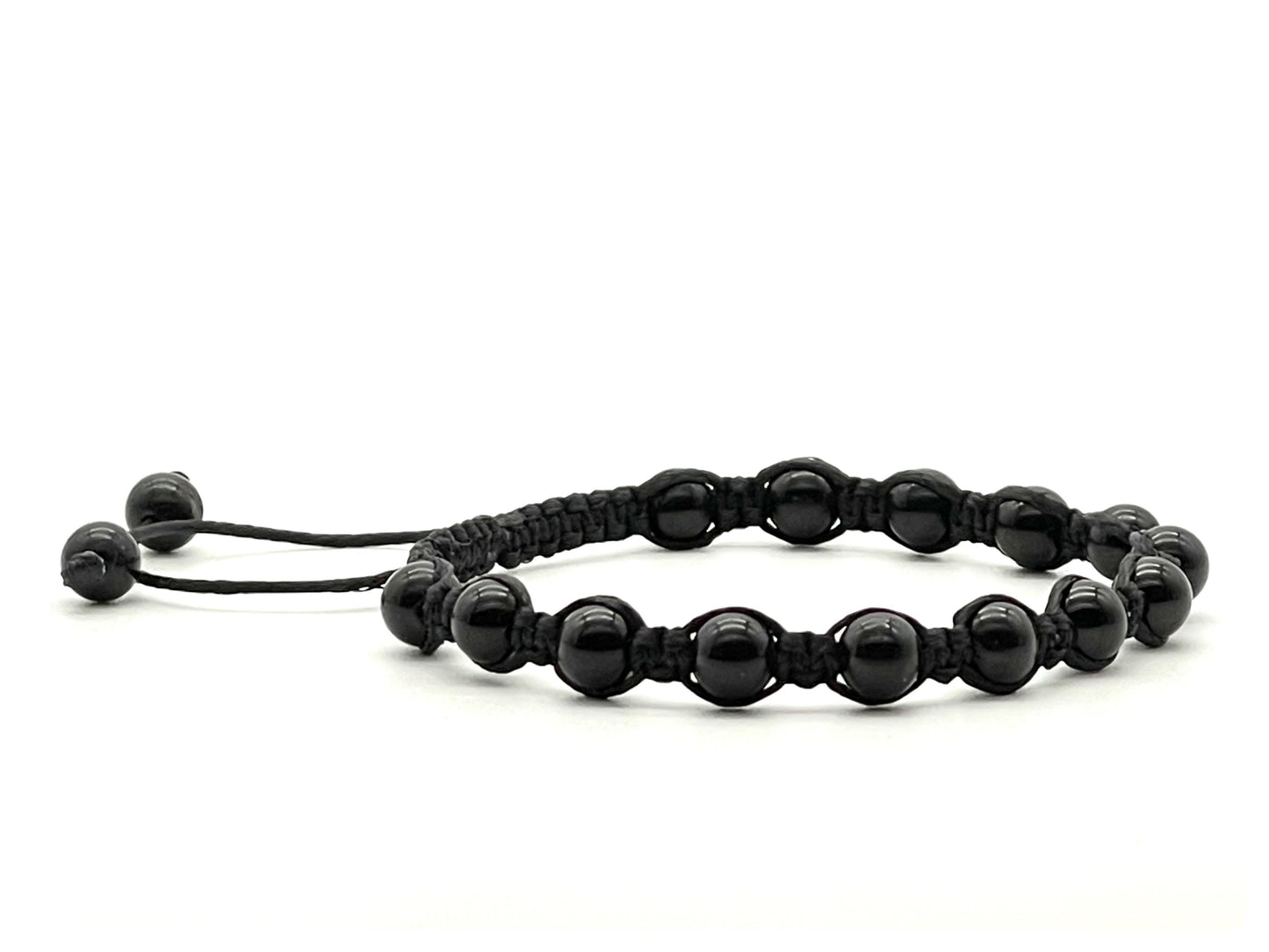 A macrame bracelet made with 6mm black tourmaline beads, crafted from black cotton waxed cord, adjustable from 17cm to 22cm, suitable for both men and women.