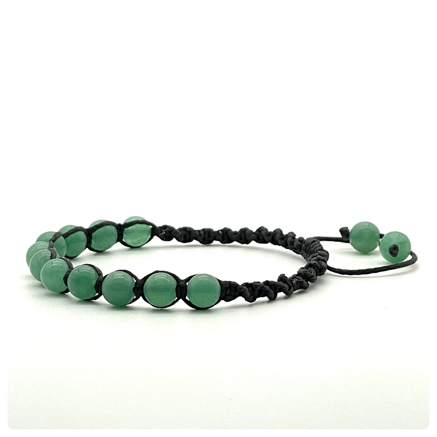 A macrame bracelet made with 6mm aventurine beads, crafted from black cotton waxed cord, adjustable from 17cm to 22cm, suitable for women.