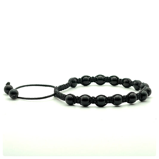 A macrame bracelet made with 6mm onyx beads, crafted from black cotton waxed cord, adjustable from 17cm to 22cm, suitable for both men and women.